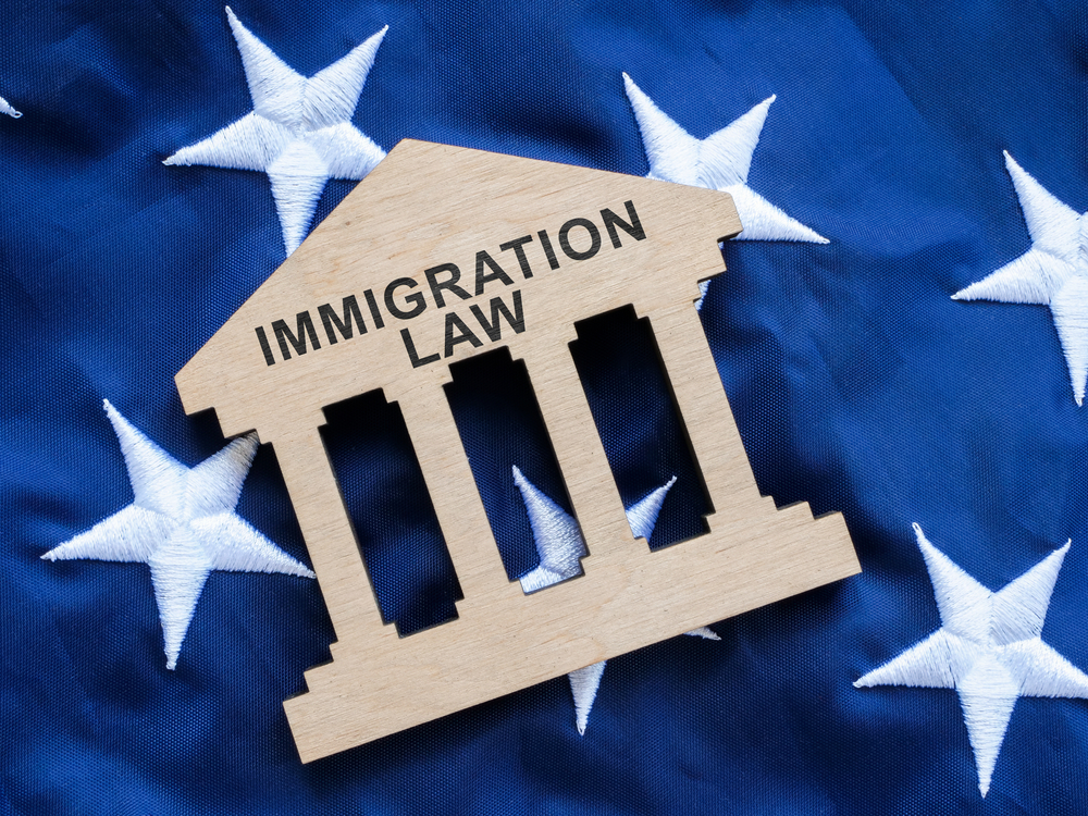 Immigration sign on u.s. flag
